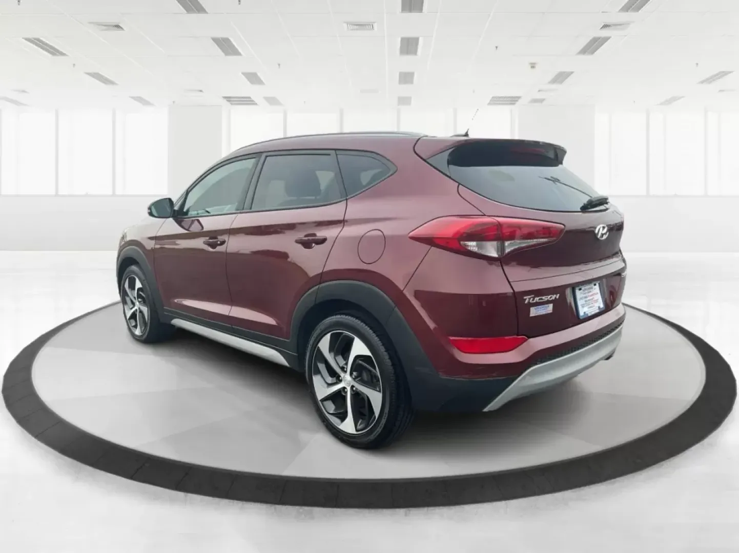 2017 Hyundai Tucson Sport (KM8J3CA29HU) with an 1.6L I-4 gasoline direct injection engine, located at 1099 N County Rd 25A, Troy, OH, 45373, (937) 908-9800, 40.057079, -84.212883 - **Discover Adventure in the 2017 Hyundai Tucson: Your Ideal SUV for Every Journey!**<br /> <br /> Are you ready to elevate your driving experience? The 2017 Hyundai Tucson in striking Ruby Wine is here, tailored for those who crave versatility and reliability in their daily adventures. Whether you'r - Photo#4