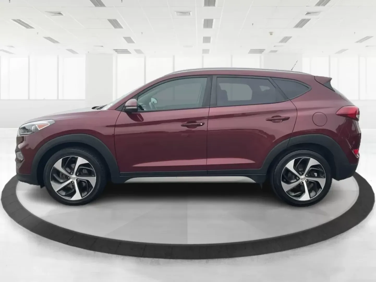 2017 Hyundai Tucson Sport (KM8J3CA29HU) with an 1.6L I-4 gasoline direct injection engine, located at 1099 N County Rd 25A, Troy, OH, 45373, (937) 908-9800, 40.057079, -84.212883 - **Discover Adventure in the 2017 Hyundai Tucson: Your Ideal SUV for Every Journey!**<br /> <br /> Are you ready to elevate your driving experience? The 2017 Hyundai Tucson in striking Ruby Wine is here, tailored for those who crave versatility and reliability in their daily adventures. Whether you'r - Photo#5