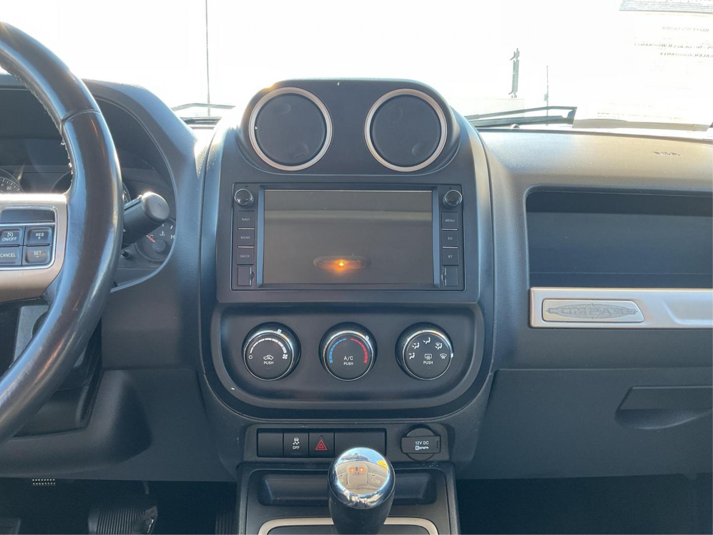 2017 White Knuckle Clear Coat Jeep Compass Sport FWD (1C4NJCBB4HD) with an 2.4L L4 DOHC 16V engine, located at 8750 N County Rd 25A, Piqua, OH, 45356, (937) 908-9800, 40.164391, -84.232513 - 2017 Jeep Compass Sport FWD - Photo#12