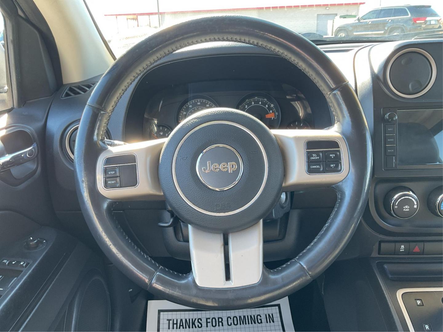 2017 White Knuckle Clear Coat Jeep Compass Sport FWD (1C4NJCBB4HD) with an 2.4L L4 DOHC 16V engine, located at 8750 N County Rd 25A, Piqua, OH, 45356, (937) 908-9800, 40.164391, -84.232513 - 2017 Jeep Compass Sport FWD - Photo#15