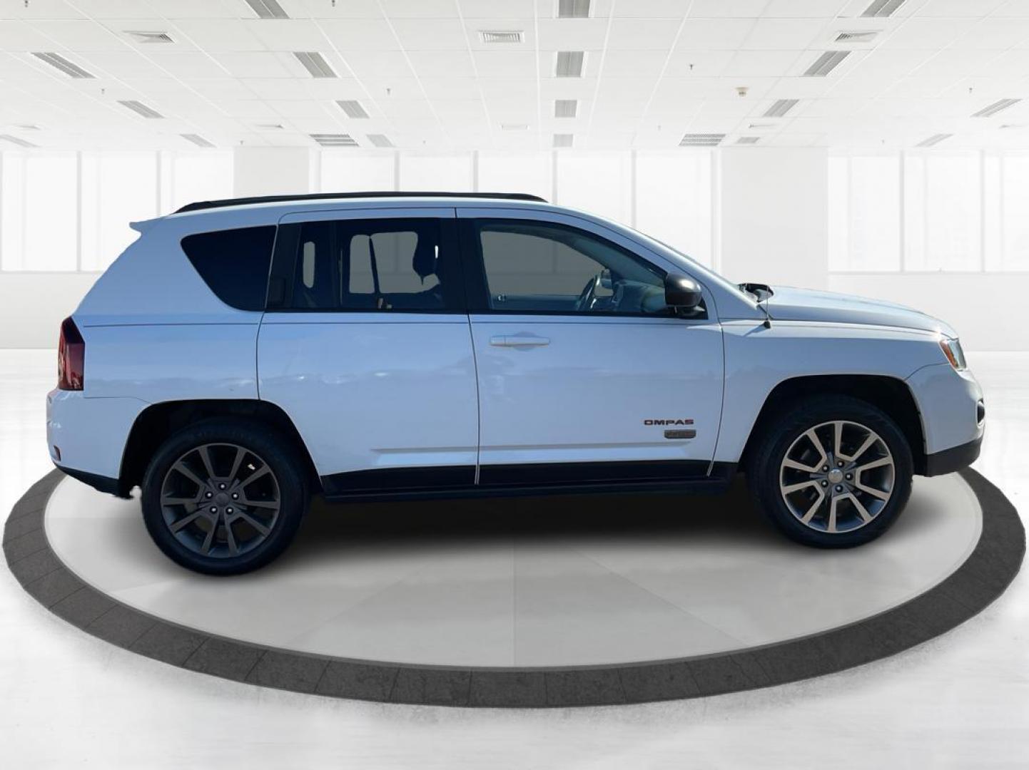 2017 White Knuckle Clear Coat Jeep Compass Sport FWD (1C4NJCBB4HD) with an 2.4L L4 DOHC 16V engine, located at 8750 N County Rd 25A, Piqua, OH, 45356, (937) 908-9800, 40.164391, -84.232513 - 2017 Jeep Compass Sport FWD - Photo#1