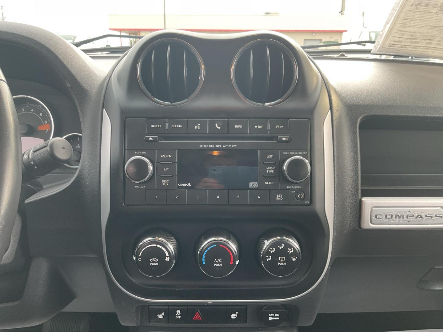 2017 Jeep Compass Latitude 4x4 (1C4NJDEB9HD) with an 2.4L I-4 DOHC engine, located at 4508 South Dixie Dr, Moraine, OH, 45439, (937) 908-9800, 39.689976, -84.218452 - 2017 Jeep Compass Latitude 4x4 - Photo#12