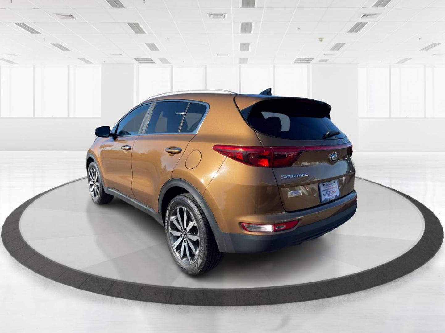 2017 Kia Sportage EX (KNDPNCAC2H7) with an Theta II 2.4L I-4 gasoline direct injection engine, located at 1230 East Main St, Xenia, OH, 45385, (937) 908-9800, 39.688026, -83.910172 - 2017 Kia Sportage EX - Photo#4