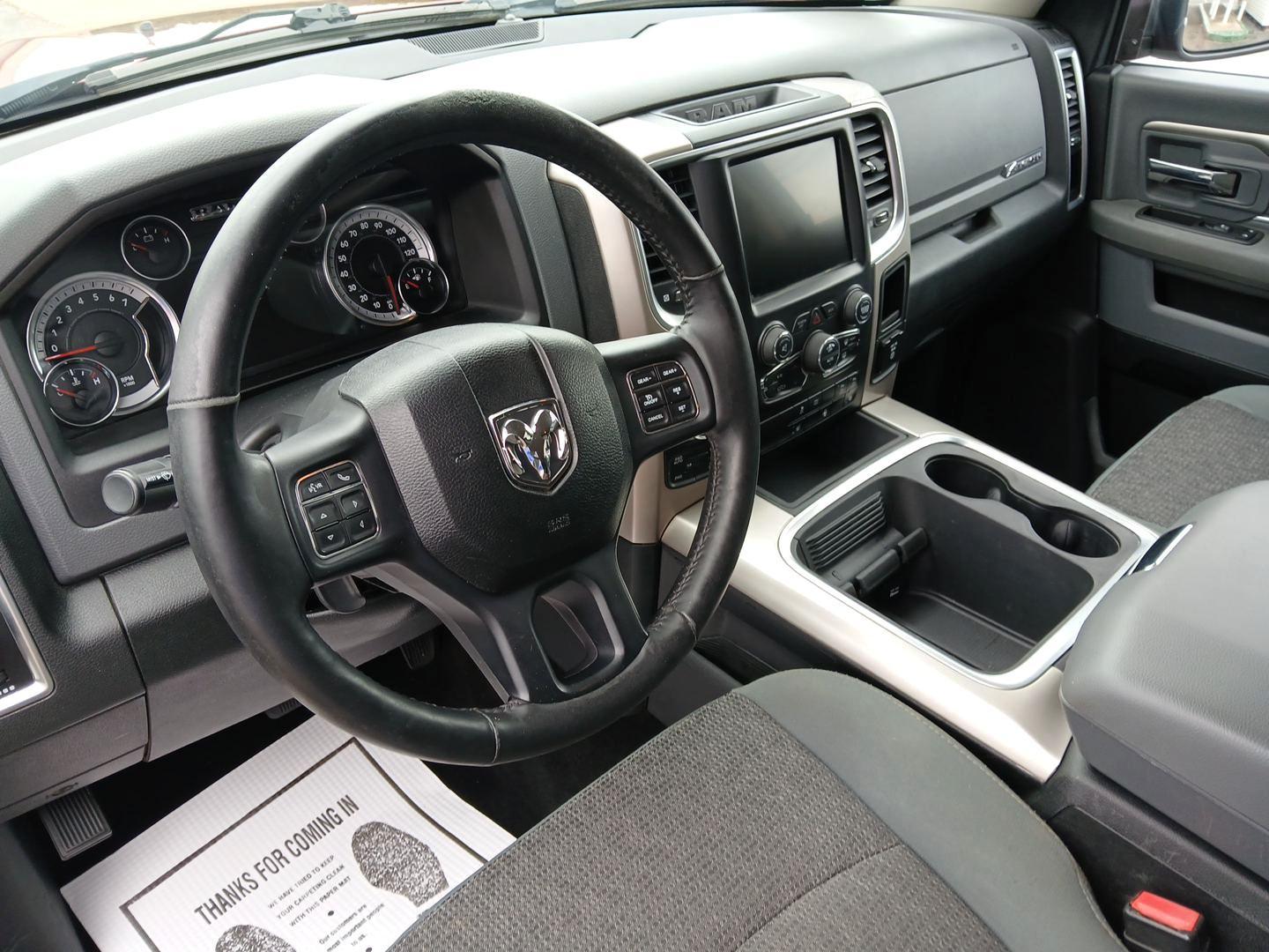 2017 Ram 1500 SLT Crew Cab SWB 4WD (3C6RR7LT1HG) with an 5.7L V8 OHV 16V engine, 8-Speed Automatic transmission, located at 880 E. National Road, Vandalia, OH, 45377, (937) 908-9800, 39.891918, -84.183594 - 2017 Ram 1500 SLT Crew Cab SWB 4WD - Photo#8