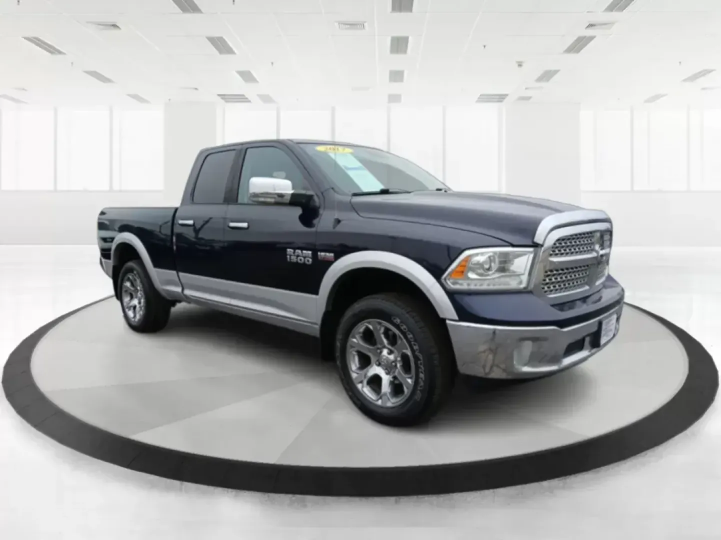 2017 Ram 1500 Laramie Quad Cab 4WD (1C6RR7JT1HS) with an 5.7L V8 OHV 16V engine, 8-Speed Automatic transmission, located at 1184 Kauffman Ave, Fairborn, OH, 45324, (937) 908-9800, 39.807072, -84.030914 - 2017 Ram 1500 Laramie Quad Cab 4WD - Photo#0