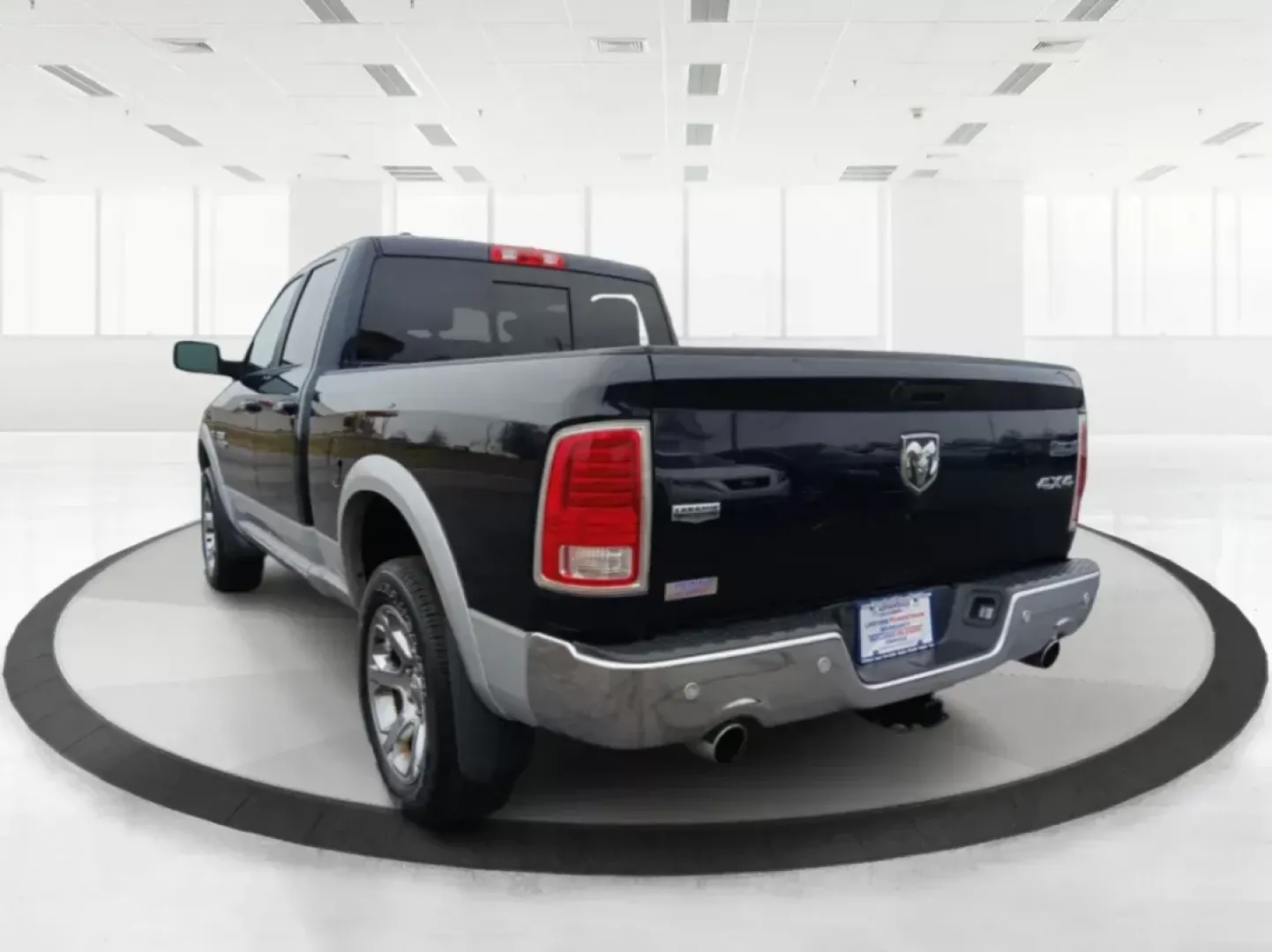 2017 Ram 1500 Laramie Quad Cab 4WD (1C6RR7JT1HS) with an 5.7L V8 OHV 16V engine, 8-Speed Automatic transmission, located at 1184 Kauffman Ave, Fairborn, OH, 45324, (937) 908-9800, 39.807072, -84.030914 - 2017 Ram 1500 Laramie Quad Cab 4WD - Photo#4