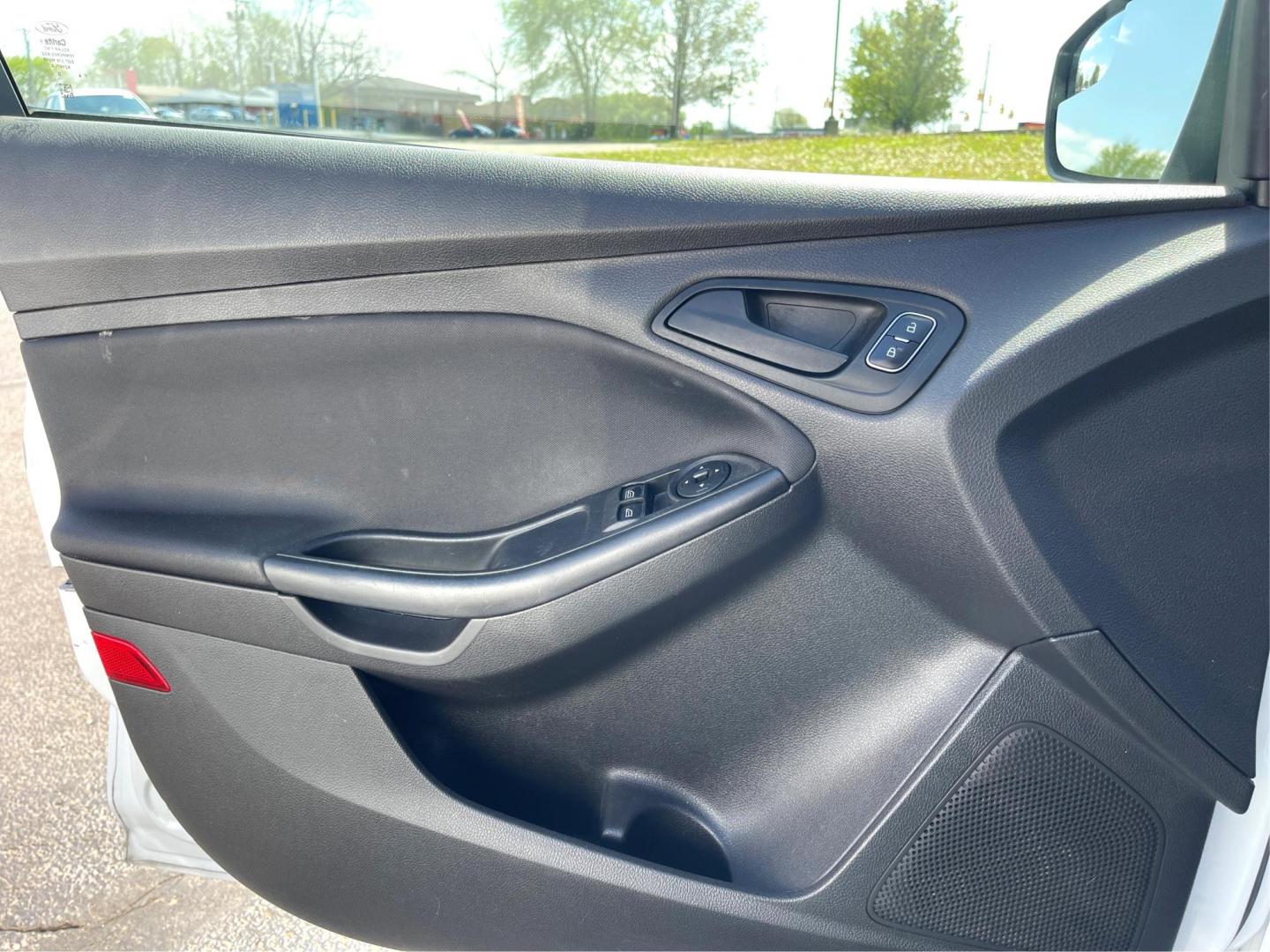 2018 Ford Focus S Sedan (1FADP3E20JL) with an 2.0L L4 DOHC 16V engine, 5-Speed Manual transmission, located at 1230 East Main St, Xenia, OH, 45385, (937) 908-9800, 39.688026, -83.910172 - One Owner - Photo#13