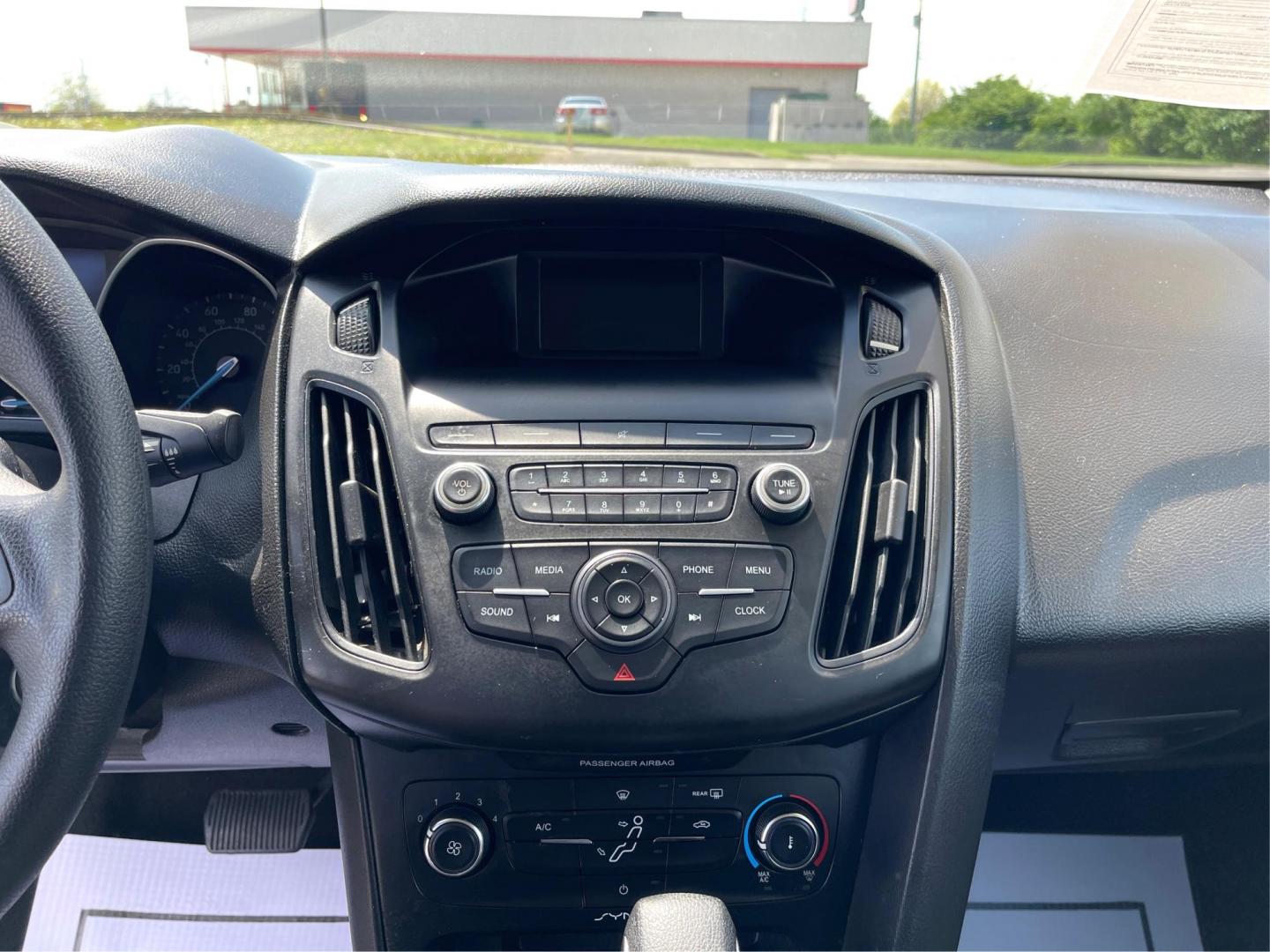 2018 Ford Focus S Sedan (1FADP3E20JL) with an 2.0L L4 DOHC 16V engine, 5-Speed Manual transmission, located at 1230 East Main St, Xenia, OH, 45385, (937) 908-9800, 39.688026, -83.910172 - One Owner - Photo#8