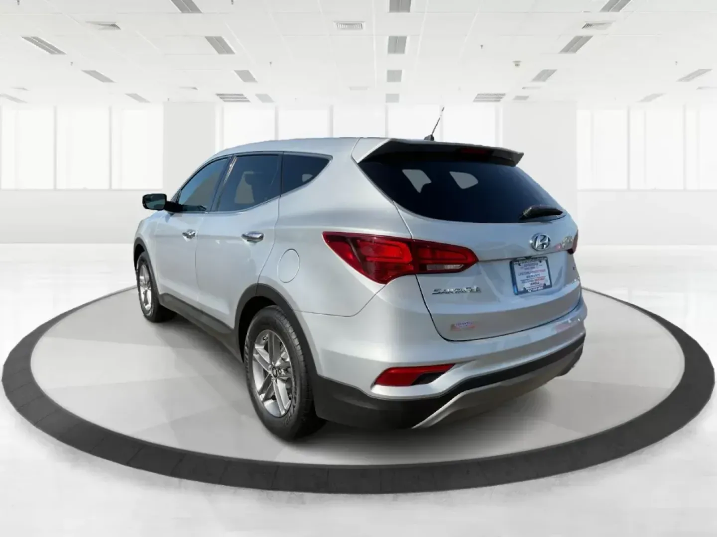 2018 Hyundai Santa Fe Sport 2.4L (5XYZT3LB2JG) with an Theta II 2.4L I-4 gasoline direct injection engine, located at 8750 N County Rd 25A, Piqua, OH, 45356, (937) 908-9800, 40.164391, -84.232513 - 2018 Hyundai Santa Fe Sport 2.4L - Photo#4