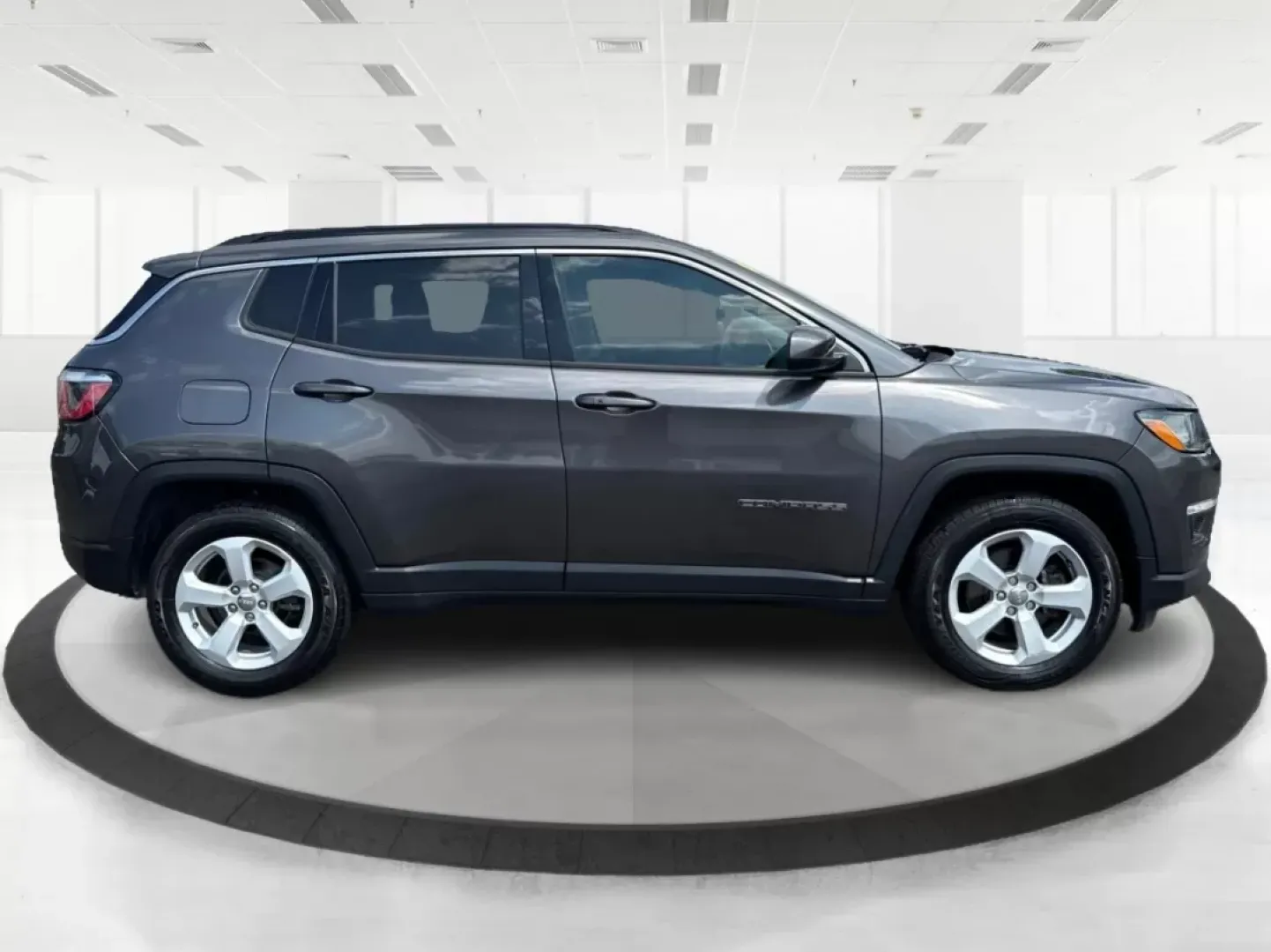 2018 Jeep Compass Latitude FWD (3C4NJCBB1JT) with an 2.4L I-4 variable valve control engine, located at 8750 N County Rd 25A, Piqua, OH, 45356, (937) 908-9800, 40.164391, -84.232513 - **Adventure Awaits with This 2018 Jeep Compass Latitude FWD!**<br /> <br /> Transform your everyday travels into unforgettable adventures with the 2018 Jeep Compass Latitude FWD. This SUV is not just a mode of transportation; it's your ticket to exploration, whether it's cruising through the scenic - Photo#1