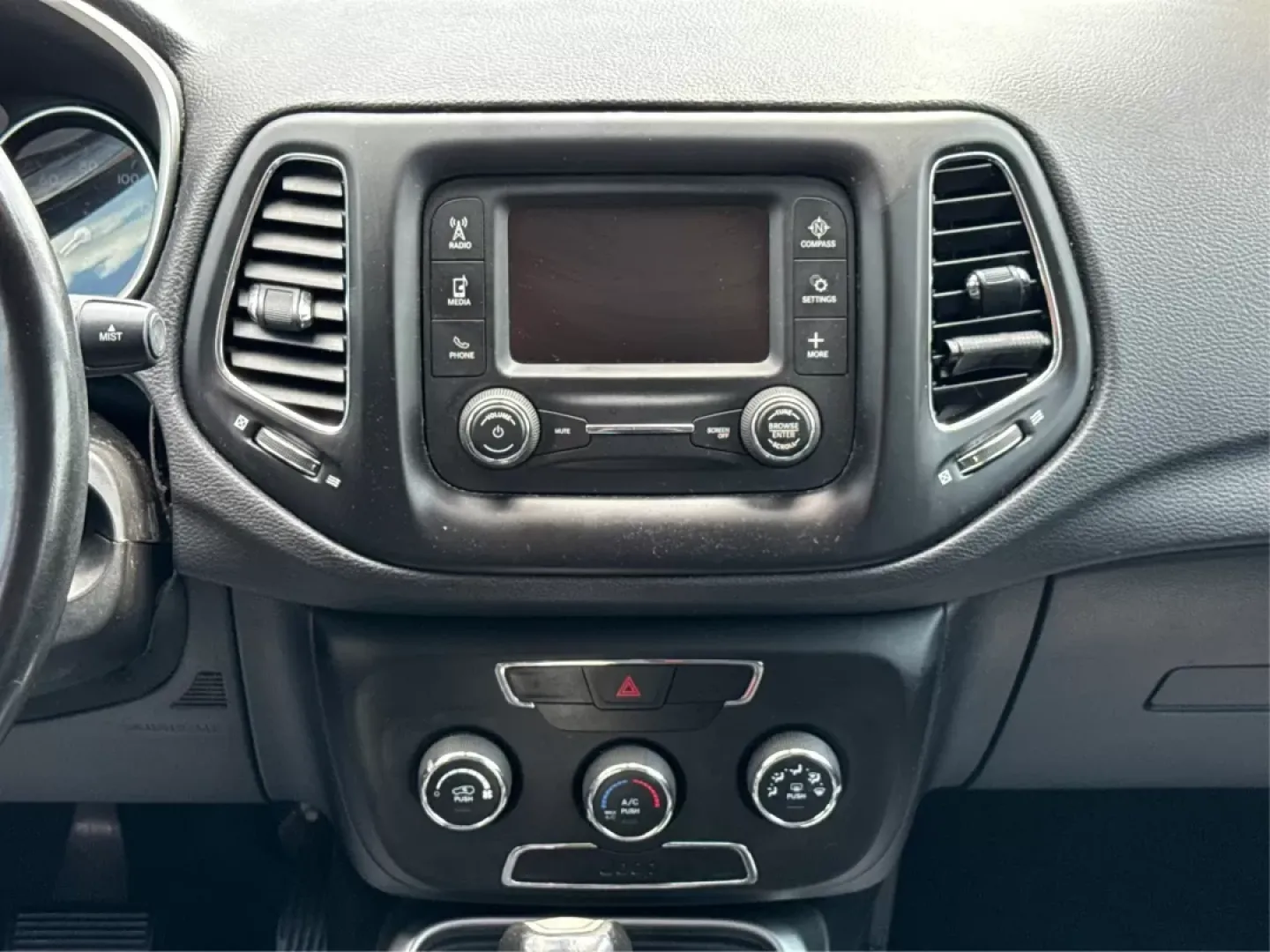 2018 Jeep Compass Latitude FWD (3C4NJCBB1JT) with an 2.4L I-4 variable valve control engine, located at 8750 N County Rd 25A, Piqua, OH, 45356, (937) 908-9800, 40.164391, -84.232513 - **Adventure Awaits with This 2018 Jeep Compass Latitude FWD!**<br /> <br /> Transform your everyday travels into unforgettable adventures with the 2018 Jeep Compass Latitude FWD. This SUV is not just a mode of transportation; it's your ticket to exploration, whether it's cruising through the scenic - Photo#12
