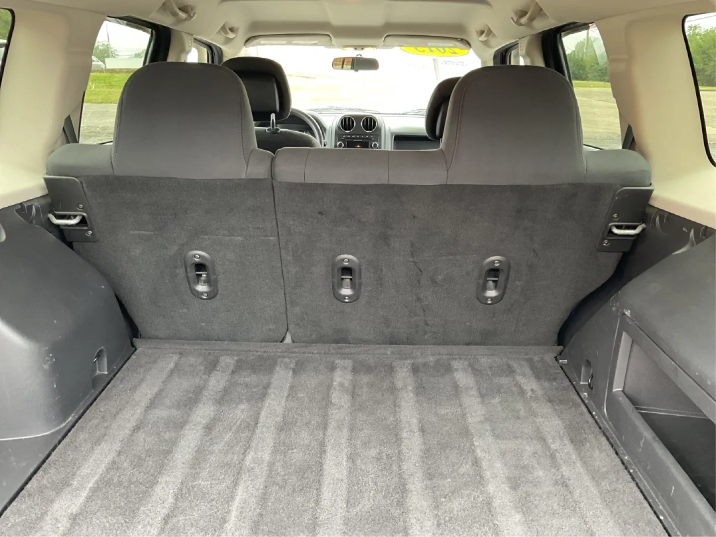 2013 Jeep Patriot Sport (1C4NJPBA8DD) with an Other engine, located at 880 E. National Road, Vandalia, OH, 45377, (937) 908-9800, 39.891918, -84.183594 - **Adventure Awaits: Discover the 2013 Jeep Patriot Sport at Advantage Car and Credit in Troy, OH!**<br /> <br /> Are you ready for your next adventure? Whether it's a weekend getaway with the family or a daily commuter ride through the beautiful streets of Troy, OH, the 2013 Jeep Patriot Sport offer - Photo#12