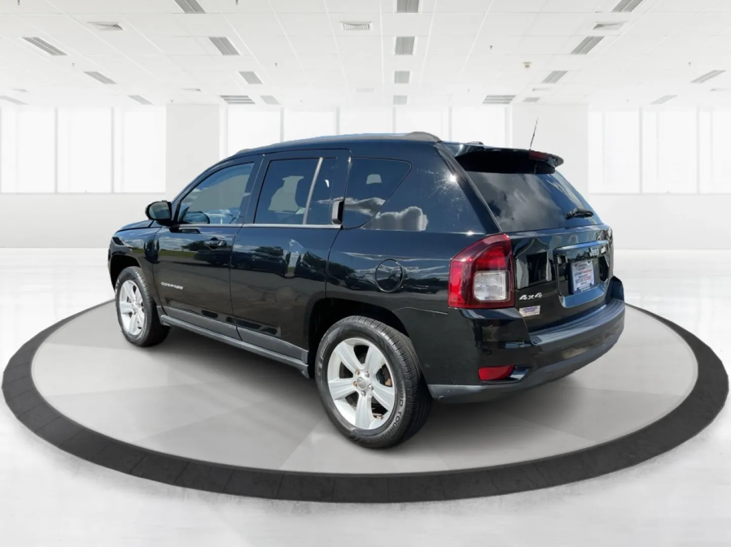 2014 Jeep Compass Latitude 4WD (1C4NJDEB8ED) with an 2.4L L4 DOHC 16V engine, Continuously Variable Transmission transmission, located at 880 E. National Road, Vandalia, OH, 45377, (937) 908-9800, 39.891918, -84.183594 - **Unleash Your Adventurous Spirit with the 2014 Jeep Compass Latitude 4WD!** <br /> <br /> Are you ready to elevate your weekend getaways or daily commutes? Look no further than the stunning 2014 Jeep Compass Latitude 4WD available at Advantage Car and Credit in Vandalia, OH! This rugged yet stylish - Photo#4