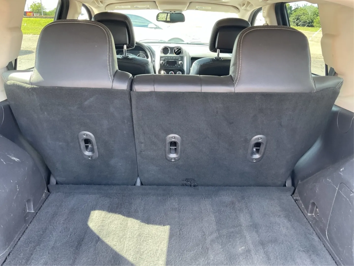 2014 Jeep Compass Latitude 4WD (1C4NJDEB8ED) with an 2.4L L4 DOHC 16V engine, Continuously Variable Transmission transmission, located at 880 E. National Road, Vandalia, OH, 45377, (937) 908-9800, 39.891918, -84.183594 - **Unleash Your Adventurous Spirit with the 2014 Jeep Compass Latitude 4WD!** <br /> <br /> Are you ready to elevate your weekend getaways or daily commutes? Look no further than the stunning 2014 Jeep Compass Latitude 4WD available at Advantage Car and Credit in Vandalia, OH! This rugged yet stylish - Photo#12