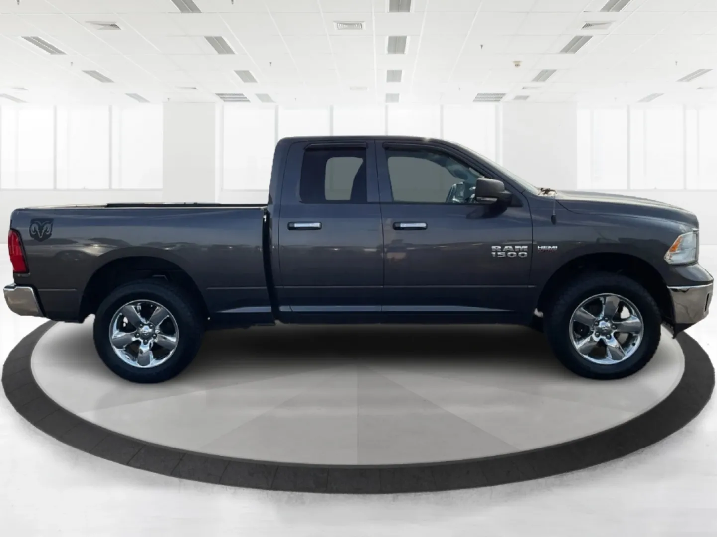 2015 Gray Ram 1500 SLT Quad Cab 4WD (1C6RR7GT3FS) with an 5.7L V8 OHV 16V engine, 8-Speed Automatic transmission, located at 1099 N County Rd 25A, Troy, OH, 45373, (937) 908-9800, 40.057079, -84.212883 - **Experience Adventure and Utility with this 2015 Ram 1500 SLT Quad Cab!**<br /> <br /> Are you ready to elevate your weekend adventures while ensuring your daily commute remains smooth and comfortable? Look no further than this robust 2015 Ram 1500 SLT Quad Cab, now available at Advantage Car and C - Photo#1
