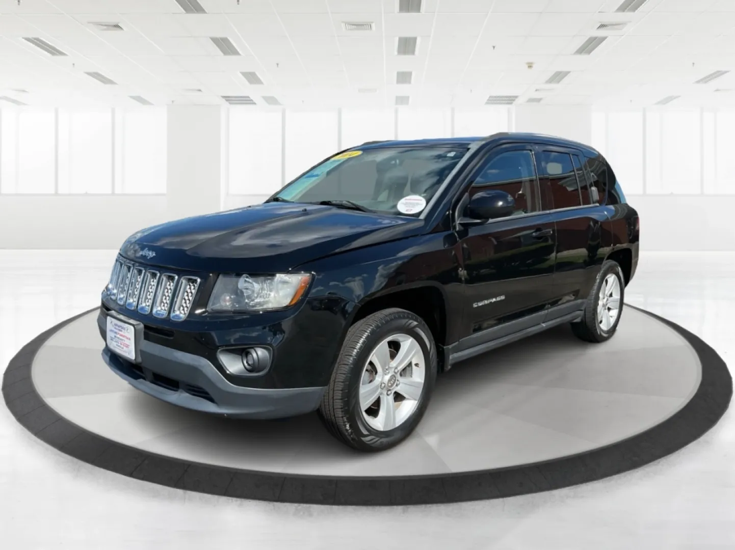 2014 Jeep Compass Latitude 4WD (1C4NJDEB8ED) with an 2.4L L4 DOHC 16V engine, Continuously Variable Transmission transmission, located at 880 E. National Road, Vandalia, OH, 45377, (937) 908-9800, 39.891918, -84.183594 - **Unleash Your Adventurous Spirit with the 2014 Jeep Compass Latitude 4WD!** <br /> <br /> Are you ready to elevate your weekend getaways or daily commutes? Look no further than the stunning 2014 Jeep Compass Latitude 4WD available at Advantage Car and Credit in Vandalia, OH! This rugged yet stylish - Photo#8