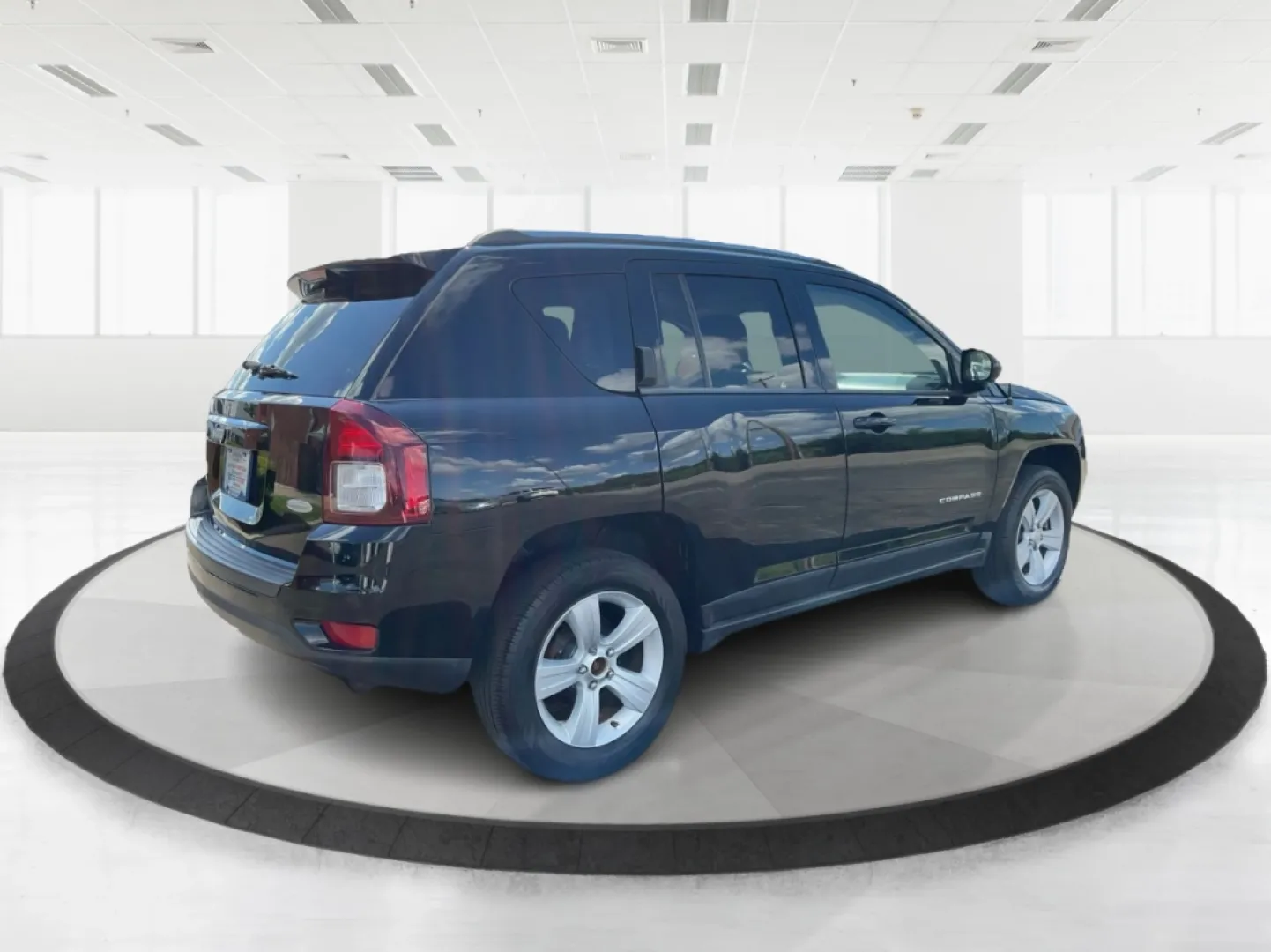 2014 Jeep Compass Latitude 4WD (1C4NJDEB8ED) with an 2.4L L4 DOHC 16V engine, Continuously Variable Transmission transmission, located at 880 E. National Road, Vandalia, OH, 45377, (937) 908-9800, 39.891918, -84.183594 - **Unleash Your Adventurous Spirit with the 2014 Jeep Compass Latitude 4WD!** <br /> <br /> Are you ready to elevate your weekend getaways or daily commutes? Look no further than the stunning 2014 Jeep Compass Latitude 4WD available at Advantage Car and Credit in Vandalia, OH! This rugged yet stylish - Photo#2