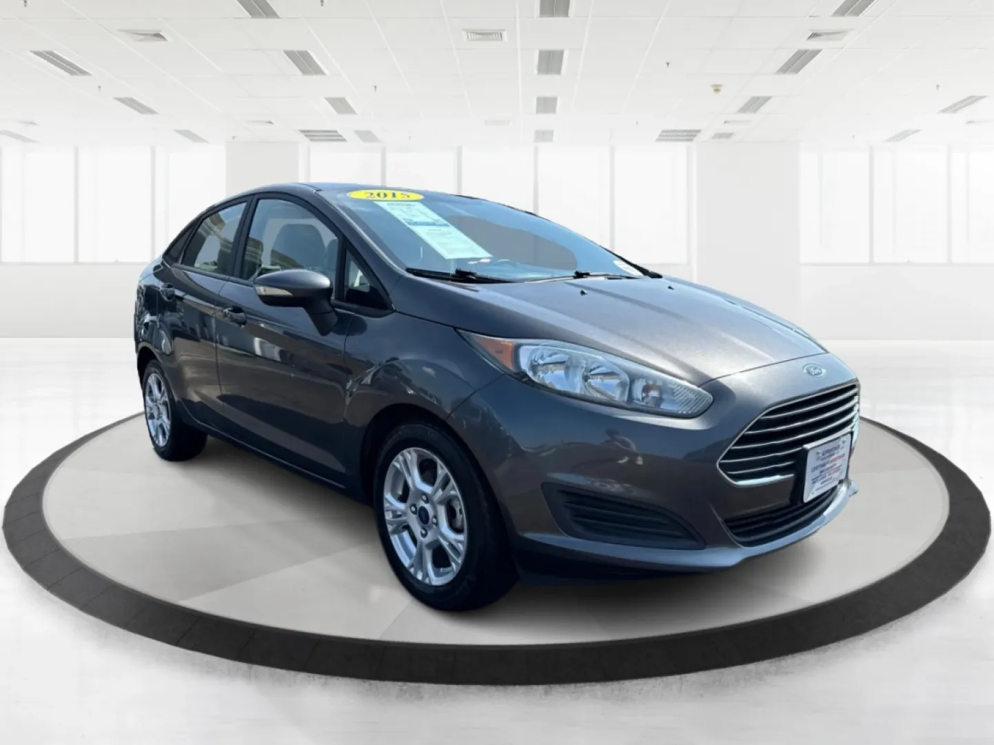 2015 Ford Fiesta SE (3FADP4BJ4FM) with an EcoBoost 1L I-3 gasoline direct injection engine, located at 8750 N County Rd 25A, Piqua, OH, 45356, (937) 908-9800, 40.164391, -84.232513 - **Discover Adventure and Style with the 2015 Ford Fiesta SE at Advantage Car and Credit in Fairborn, OH!**<br /> <br /> Are you ready to elevate your daily commute or weekend adventures? The 2015 Ford Fiesta SE is the ideal sedan for budget-conscious buyers seeking a reliable and stylish companion. - Photo#0