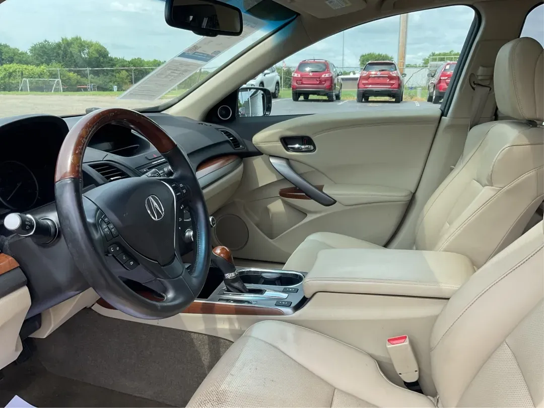 2014 Acura RDX Base (5J8TB3H39EL) with an Other engine, located at 880 E. National Road, Vandalia, OH, 45377, (937) 908-9800, 39.891918, -84.183594 - Unleash the perfect blend of comfort and versatility with the 2014 Acura RDX, a crossover that caters to both your daily grind and weekend adventures. Whether you're a growing family seeking spaciousness, a commuter looking for reliability, or a weekend warrior ready for road trips, this vehicle has - Photo#9