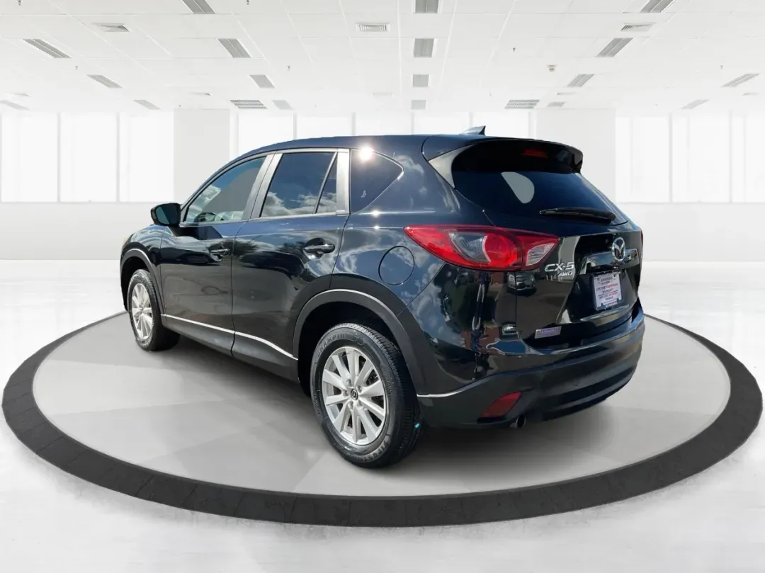 2014 Jet Black Mica Mazda CX-5 Touring AWD (JM3KE4CY2E0) with an 2.5L L4 DOHC 16V engine, 6-Speed Automatic transmission, located at 880 E. National Road, Vandalia, OH, 45377, (937) 908-9800, 39.891918, -84.183594 - **Explore the Open Road in the 2014 Mazda CX-5 Touring AWD from Advantage Car and Credit - Troy!**<br /> <br /> Are you ready to elevate your driving experience? Whether you're a growing family seeking a reliable SUV for weekend adventures, a commuter looking for comfort on long drives, or a budget- - Photo#3