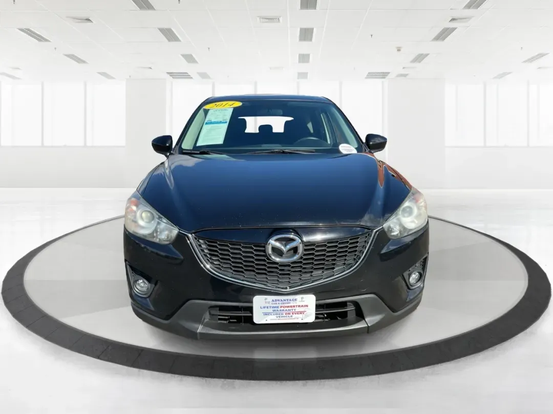2014 Jet Black Mica Mazda CX-5 Touring AWD (JM3KE4CY2E0) with an 2.5L L4 DOHC 16V engine, 6-Speed Automatic transmission, located at 880 E. National Road, Vandalia, OH, 45377, (937) 908-9800, 39.891918, -84.183594 - **Explore the Open Road in the 2014 Mazda CX-5 Touring AWD from Advantage Car and Credit - Troy!**<br /> <br /> Are you ready to elevate your driving experience? Whether you're a growing family seeking a reliable SUV for weekend adventures, a commuter looking for comfort on long drives, or a budget- - Photo#6