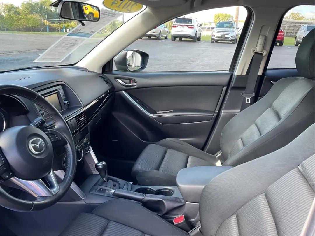 2014 Jet Black Mica Mazda CX-5 Touring AWD (JM3KE4CY2E0) with an 2.5L L4 DOHC 16V engine, 6-Speed Automatic transmission, located at 880 E. National Road, Vandalia, OH, 45377, (937) 908-9800, 39.891918, -84.183594 - **Explore the Open Road in the 2014 Mazda CX-5 Touring AWD from Advantage Car and Credit - Troy!**<br /> <br /> Are you ready to elevate your driving experience? Whether you're a growing family seeking a reliable SUV for weekend adventures, a commuter looking for comfort on long drives, or a budget- - Photo#8