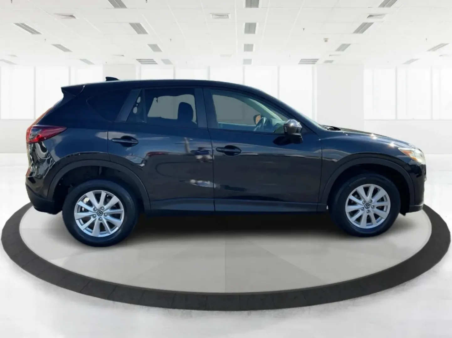 2014 Jet Black Mica Mazda CX-5 Touring AWD (JM3KE4CY2E0) with an 2.5L L4 DOHC 16V engine, 6-Speed Automatic transmission, located at 1099 N County Rd 25A, Troy, OH, 45373, (937) 908-9800, 40.057079, -84.212883 - **Explore the Open Road in the 2014 Mazda CX-5 Touring AWD from Advantage Car and Credit - Troy!**<br /> <br /> Are you ready to elevate your driving experience? Whether you're a growing family seeking a reliable SUV for weekend adventures, a commuter looking for comfort on long drives, or a budget- - Photo#1