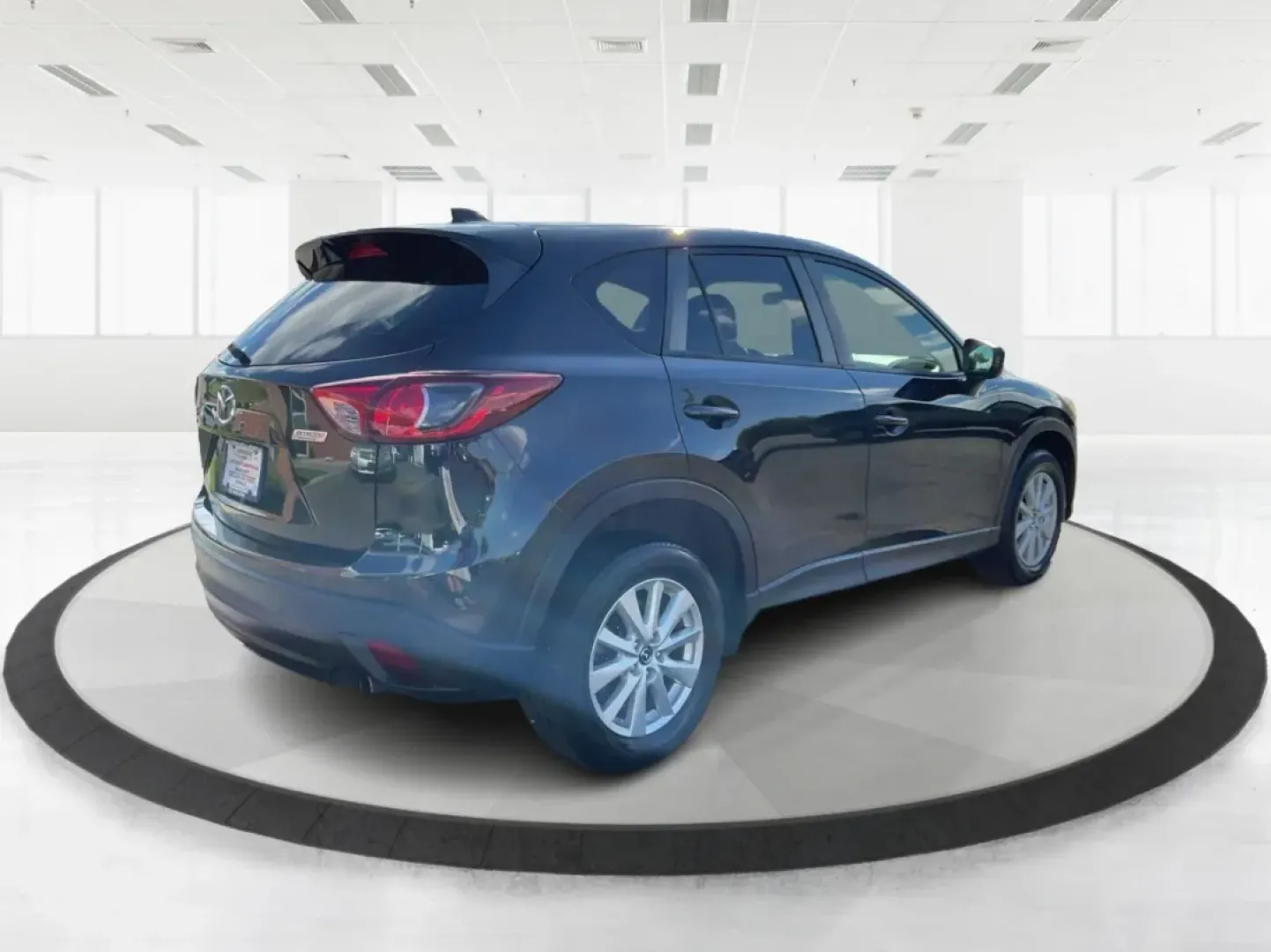 2014 Jet Black Mica Mazda CX-5 Touring AWD (JM3KE4CY2E0) with an 2.5L L4 DOHC 16V engine, 6-Speed Automatic transmission, located at 1099 N County Rd 25A, Troy, OH, 45373, (937) 908-9800, 40.057079, -84.212883 - **Explore the Open Road in the 2014 Mazda CX-5 Touring AWD from Advantage Car and Credit - Troy!**<br /> <br /> Are you ready to elevate your driving experience? Whether you're a growing family seeking a reliable SUV for weekend adventures, a commuter looking for comfort on long drives, or a budget- - Photo#2