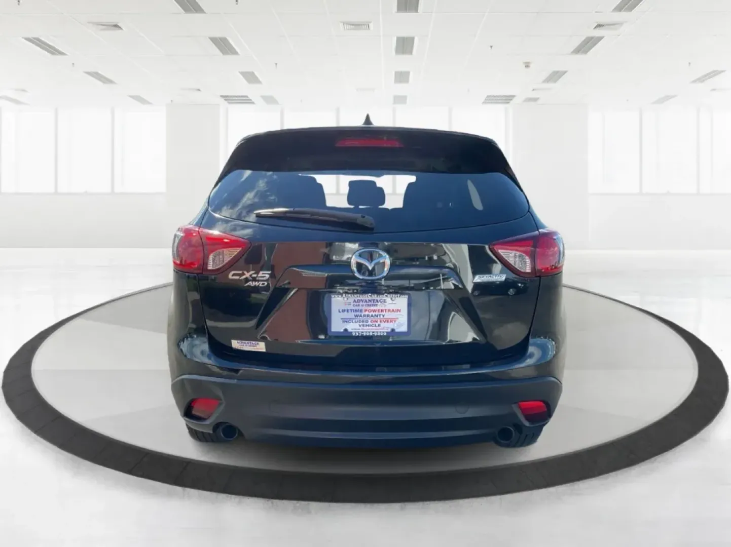2014 Jet Black Mica Mazda CX-5 Touring AWD (JM3KE4CY2E0) with an 2.5L L4 DOHC 16V engine, 6-Speed Automatic transmission, located at 1099 N County Rd 25A, Troy, OH, 45373, (937) 908-9800, 40.057079, -84.212883 - **Explore the Open Road in the 2014 Mazda CX-5 Touring AWD from Advantage Car and Credit - Troy!**<br /> <br /> Are you ready to elevate your driving experience? Whether you're a growing family seeking a reliable SUV for weekend adventures, a commuter looking for comfort on long drives, or a budget- - Photo#3