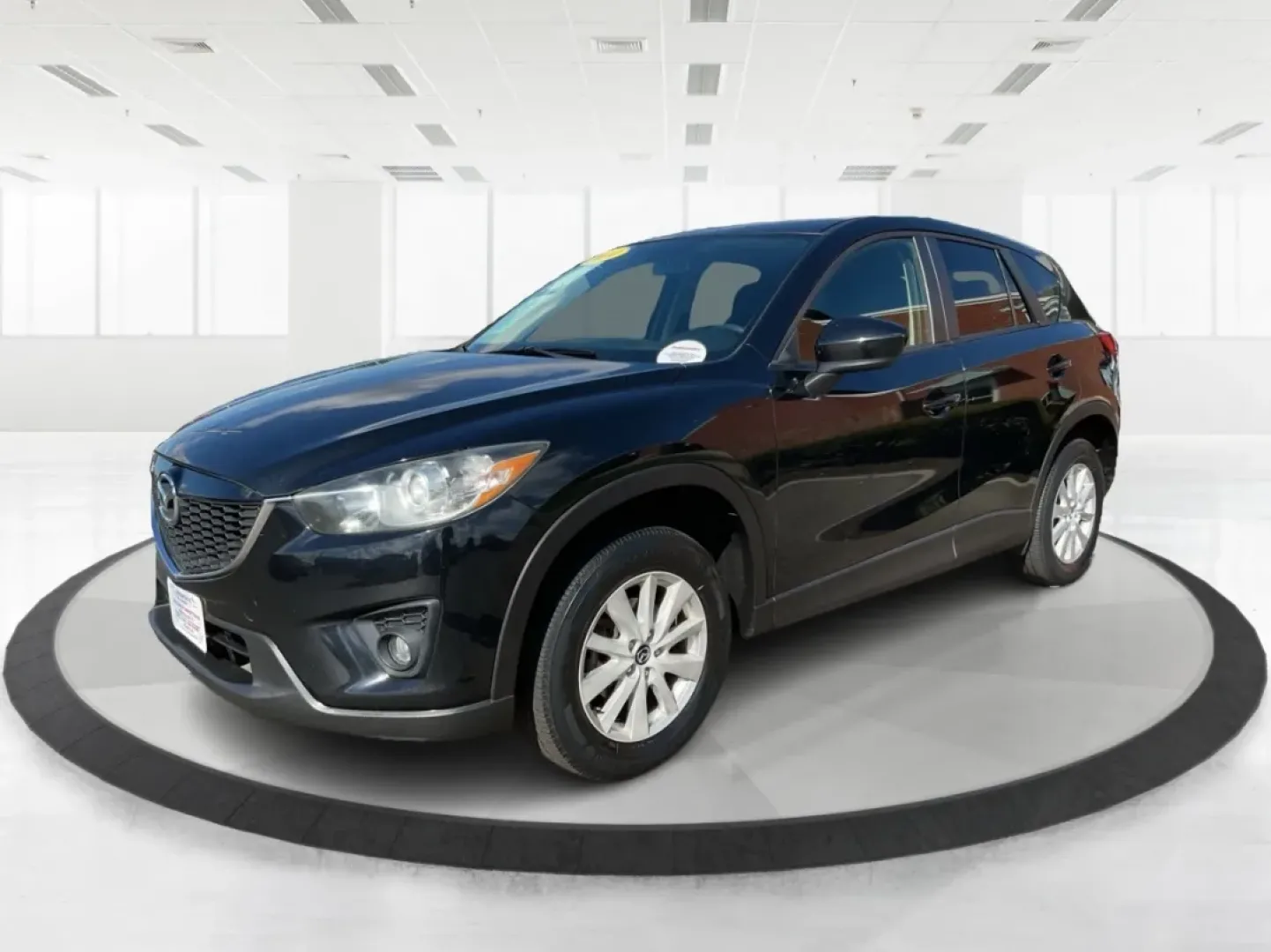 2014 Jet Black Mica Mazda CX-5 Touring AWD (JM3KE4CY2E0) with an 2.5L L4 DOHC 16V engine, 6-Speed Automatic transmission, located at 1099 N County Rd 25A, Troy, OH, 45373, (937) 908-9800, 40.057079, -84.212883 - **Explore the Open Road in the 2014 Mazda CX-5 Touring AWD from Advantage Car and Credit - Troy!**<br /> <br /> Are you ready to elevate your driving experience? Whether you're a growing family seeking a reliable SUV for weekend adventures, a commuter looking for comfort on long drives, or a budget- - Photo#8