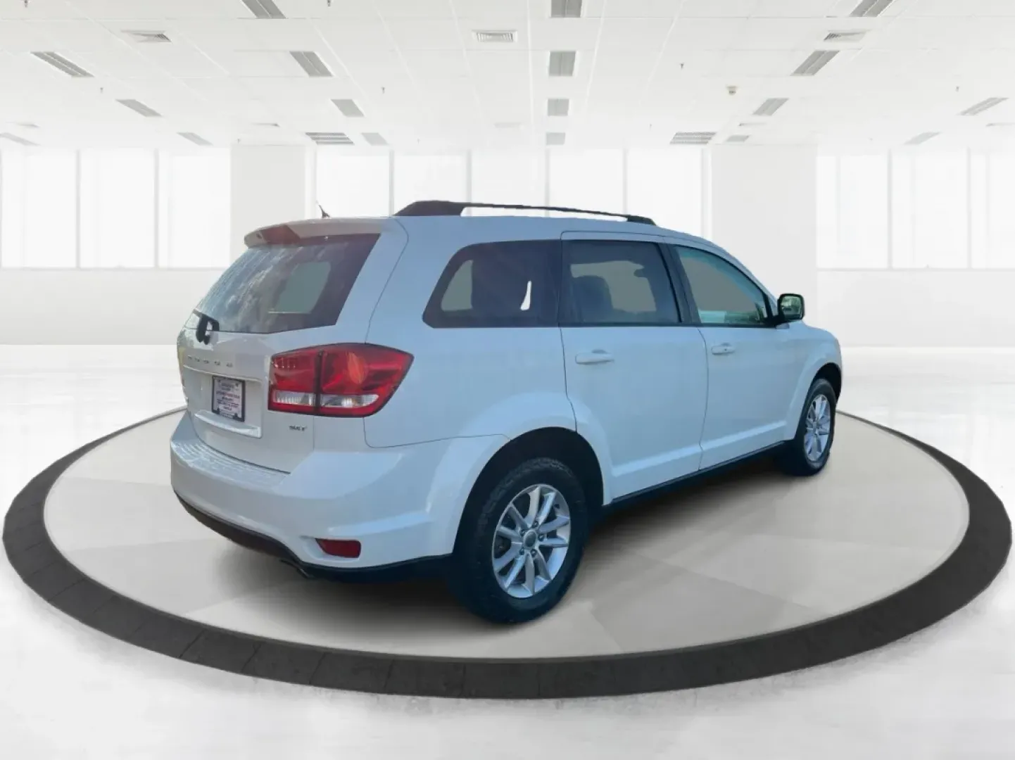 2014 Pearl White Tri-Coat Dodge Journey SXT (3C4PDCBG0ET) with an 3.6L V6 DOHC 24V engine, 6-Speed Automatic transmission, located at 1099 N County Rd 25A, Troy, OH, 45373, (937) 908-9800, 40.057079, -84.212883 - Are you looking for the perfect blend of comfort, versatility, and reliability for your family adventures? Look no further than the 2014 Dodge Journey SXT, available now at Advantage Car and Credit in Troy, OH. This well-equipped SUV is ideal for growing families, weekend road trips, or anyone who n - Photo#2