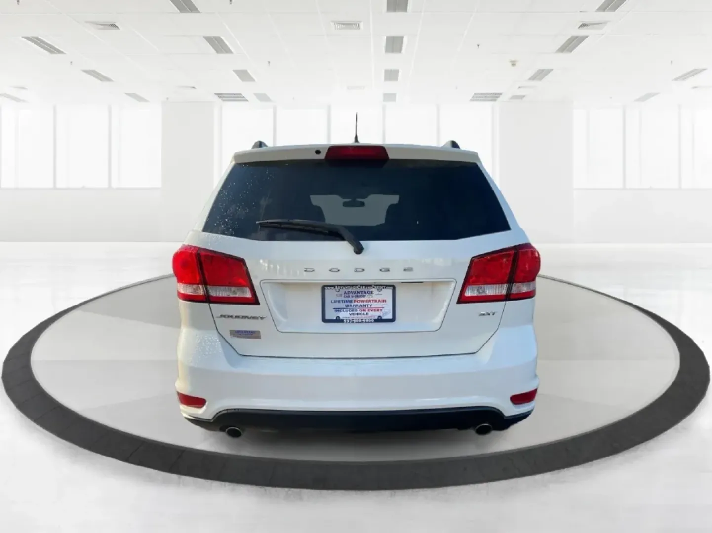 2014 Pearl White Tri-Coat Dodge Journey SXT (3C4PDCBG0ET) with an 3.6L V6 DOHC 24V engine, 6-Speed Automatic transmission, located at 1099 N County Rd 25A, Troy, OH, 45373, (937) 908-9800, 40.057079, -84.212883 - Are you looking for the perfect blend of comfort, versatility, and reliability for your family adventures? Look no further than the 2014 Dodge Journey SXT, available now at Advantage Car and Credit in Troy, OH. This well-equipped SUV is ideal for growing families, weekend road trips, or anyone who n - Photo#3