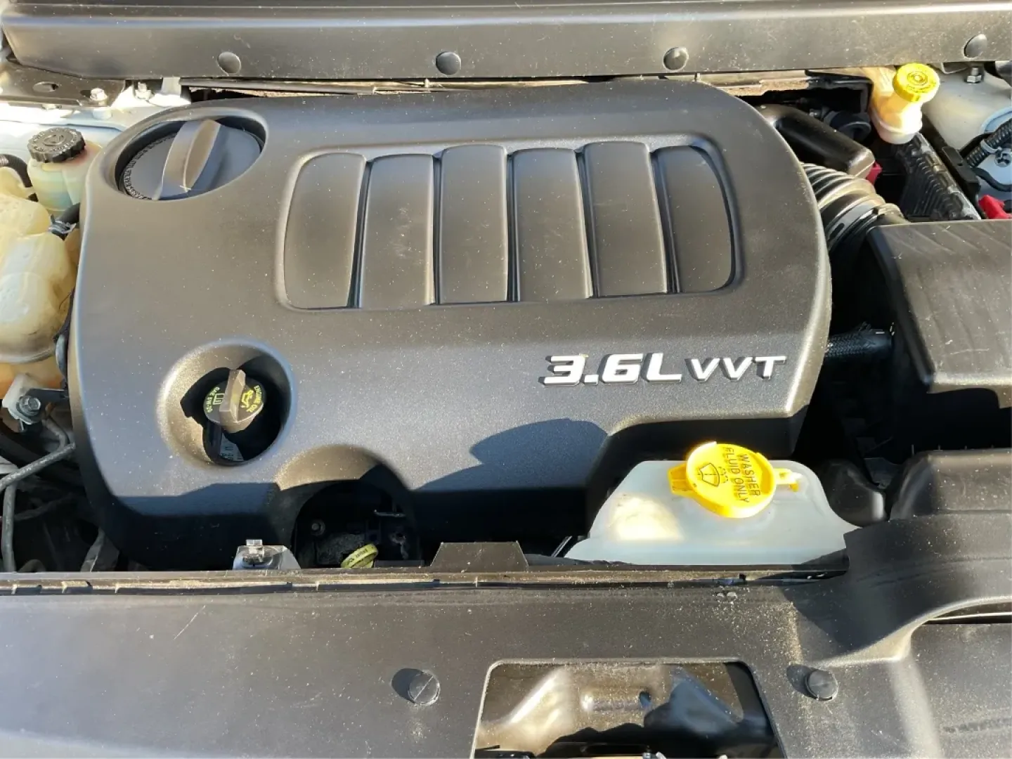 2014 Pearl White Tri-Coat Dodge Journey SXT (3C4PDCBG0ET) with an 3.6L V6 DOHC 24V engine, 6-Speed Automatic transmission, located at 1099 N County Rd 25A, Troy, OH, 45373, (937) 908-9800, 40.057079, -84.212883 - Are you looking for the perfect blend of comfort, versatility, and reliability for your family adventures? Look no further than the 2014 Dodge Journey SXT, available now at Advantage Car and Credit in Troy, OH. This well-equipped SUV is ideal for growing families, weekend road trips, or anyone who n - Photo#11