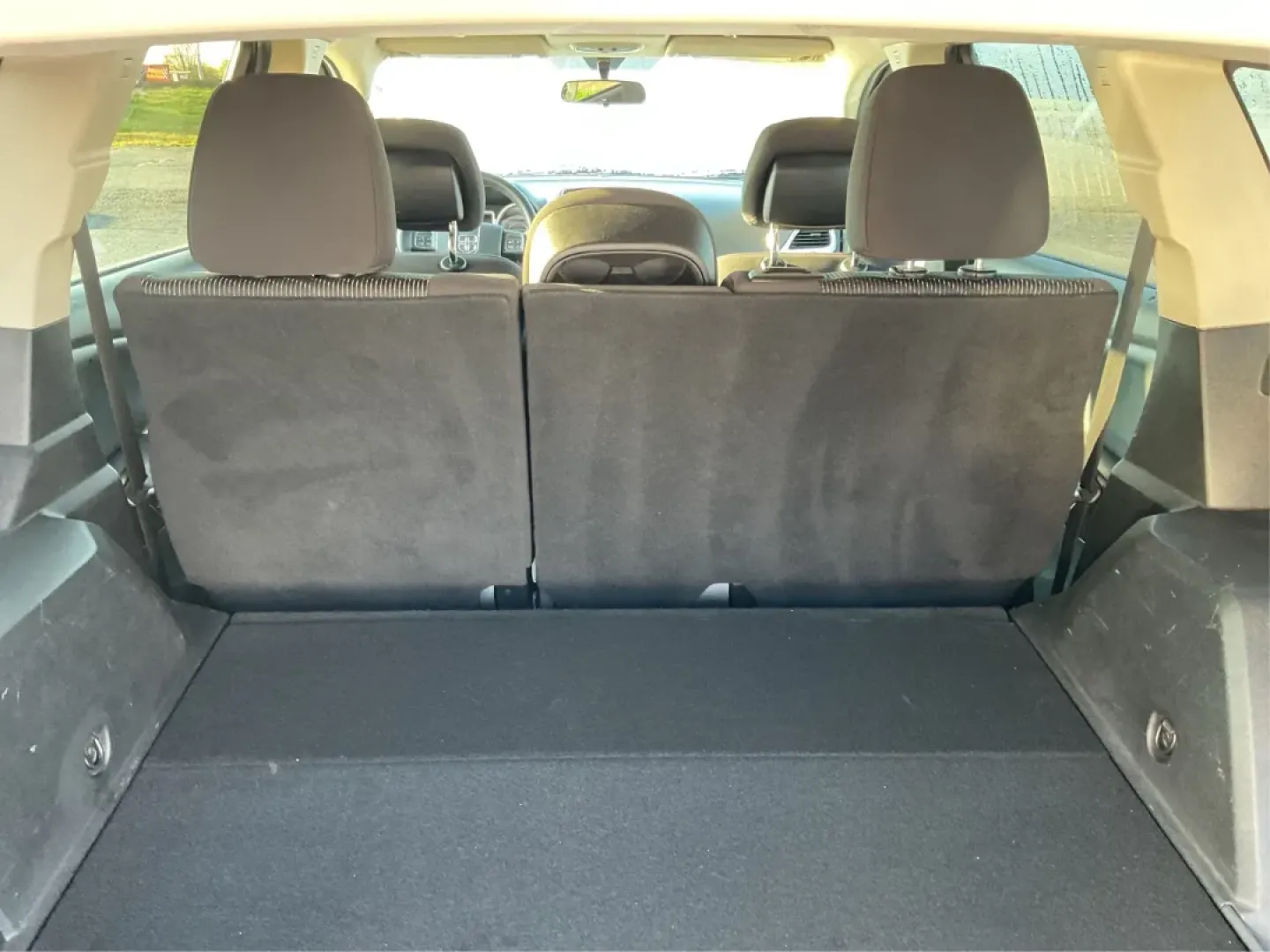 2014 Pearl White Tri-Coat Dodge Journey SXT (3C4PDCBG0ET) with an 3.6L V6 DOHC 24V engine, 6-Speed Automatic transmission, located at 1099 N County Rd 25A, Troy, OH, 45373, (937) 908-9800, 40.057079, -84.212883 - Are you looking for the perfect blend of comfort, versatility, and reliability for your family adventures? Look no further than the 2014 Dodge Journey SXT, available now at Advantage Car and Credit in Troy, OH. This well-equipped SUV is ideal for growing families, weekend road trips, or anyone who n - Photo#12