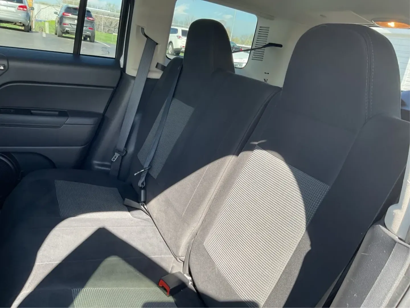 2015 Jeep Patriot Altitude Edition (1C4NJPBA1FD) with an 2L I-4 DOHC engine, located at 1951 S Dayton Lakeview Rd., New Carlisle, OH, 45344, (937) 908-9800, 39.890999, -84.050255 - Are you ready to elevate your adventures and embrace a life filled with excitement? If you're a weekend wanderer or a growing family looking for a reliable SUV, the 2015 Jeep Patriot Altitude Edition at Advantage Car and Credit is here to meet your needs. With its spacious interior, rugged design, a - Photo#8