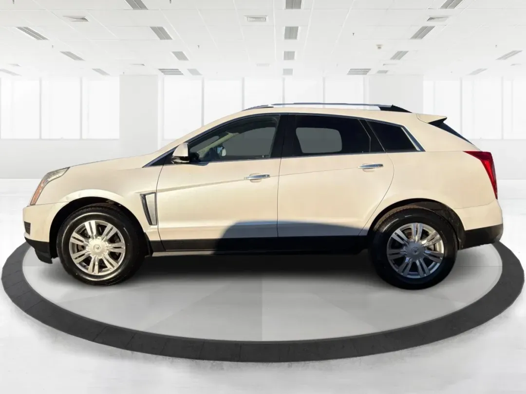 2013 White Cadillac SRX Luxury Collection (3GYFNCE32DS) with an 3.6L V6 DOHC 24V FFV engine, 6-Speed Automatic transmission, located at 8750 N County Rd 25A, Piqua, OH, 45356, (937) 908-9800, 40.164391, -84.232513 - 2013 Cadillac SRX Luxury Collection - Photo#5