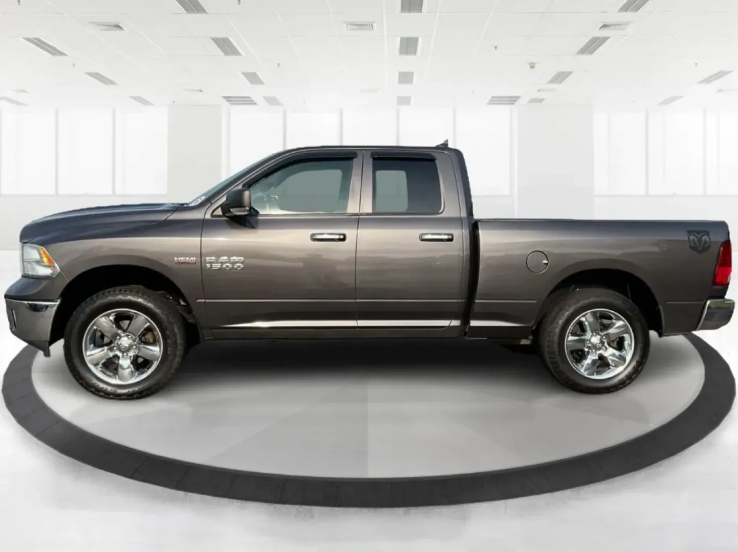 2015 Gray Ram 1500 SLT Quad Cab 4WD (1C6RR7GT3FS) with an 5.7L V8 OHV 16V engine, 8-Speed Automatic transmission, located at 1099 N County Rd 25A, Troy, OH, 45373, (937) 908-9800, 40.057079, -84.212883 - **Experience Adventure and Utility with this 2015 Ram 1500 SLT Quad Cab!**<br /> <br /> Are you ready to elevate your weekend adventures while ensuring your daily commute remains smooth and comfortable? Look no further than this robust 2015 Ram 1500 SLT Quad Cab, now available at Advantage Car and C - Photo#5