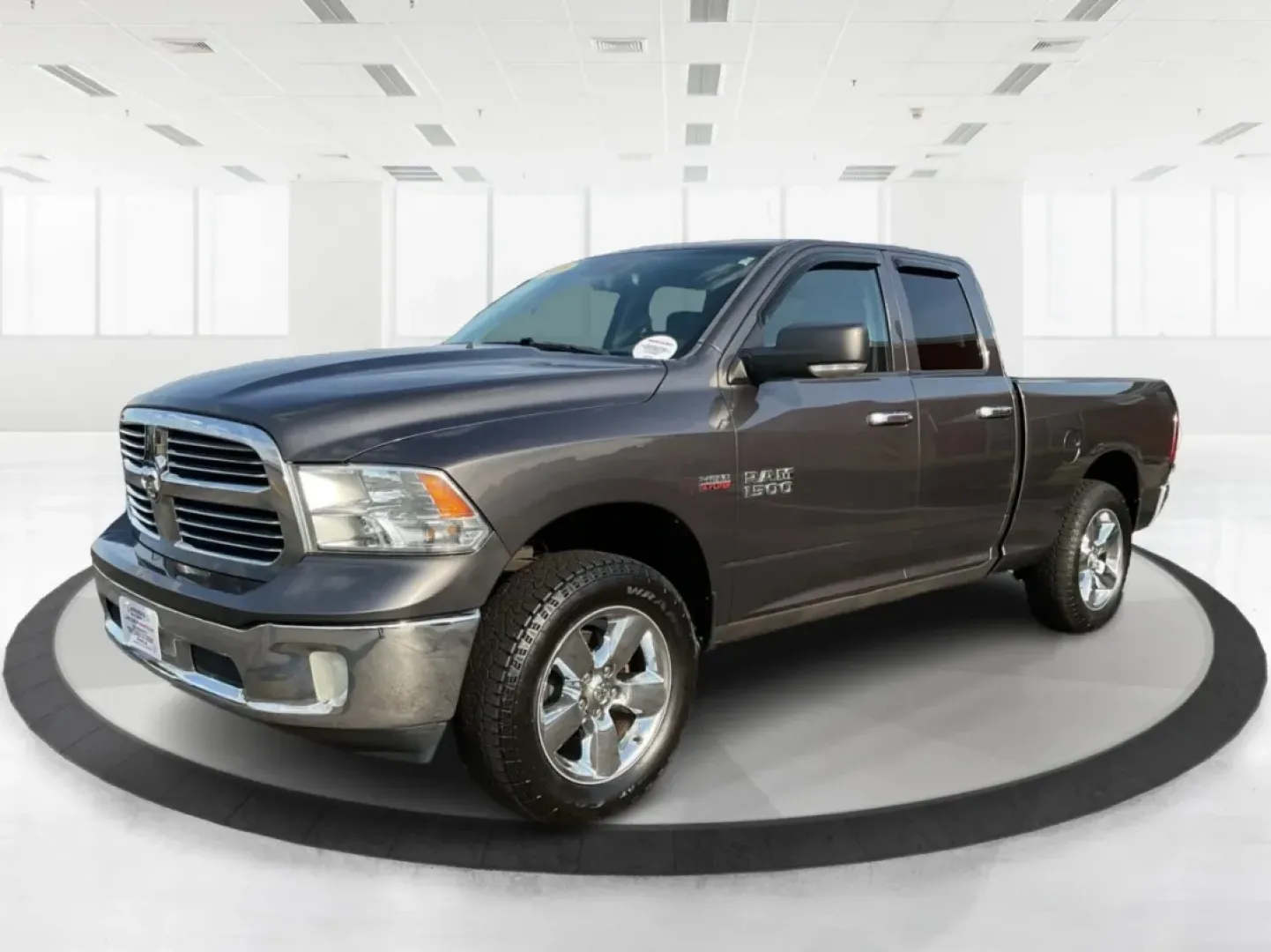 2015 Gray Ram 1500 SLT Quad Cab 4WD (1C6RR7GT3FS) with an 5.7L V8 OHV 16V engine, 8-Speed Automatic transmission, located at 1099 N County Rd 25A, Troy, OH, 45373, (937) 908-9800, 40.057079, -84.212883 - **Experience Adventure and Utility with this 2015 Ram 1500 SLT Quad Cab!**<br /> <br /> Are you ready to elevate your weekend adventures while ensuring your daily commute remains smooth and comfortable? Look no further than this robust 2015 Ram 1500 SLT Quad Cab, now available at Advantage Car and C - Photo#8