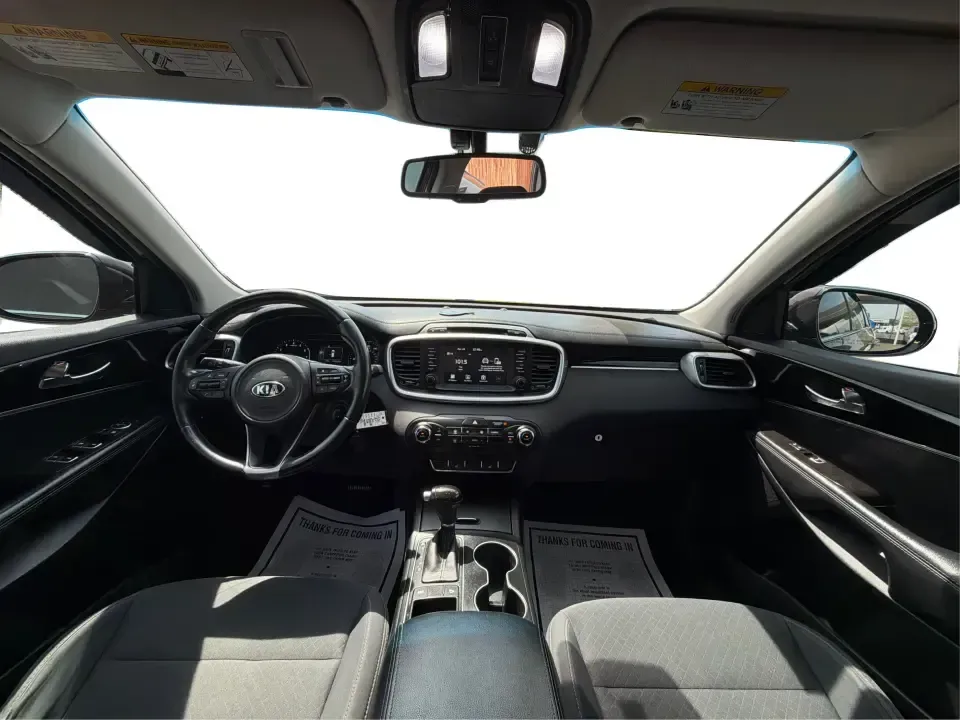 2017 Burgundy Kia Sorento L 2WD (5XYPG4A31HG) with an 2.4L L4 DOHC 16V engine, 6-Speed Automatic transmission, located at 4508 South Dixie Dr, Moraine, OH, 45439, (937) 908-9800, 39.689976, -84.218452 - Pack up the kids, load the groceries, and still have room for a spontaneous weekend escape to Carillon Historical Park or a day exploring Cox Arboretum-this 2017 Kia Sorento L 2WD is the kind of practical SUV that fits real Moraine and Dayton-area life. With three-row versatility in a midsize footpr - Photo#21