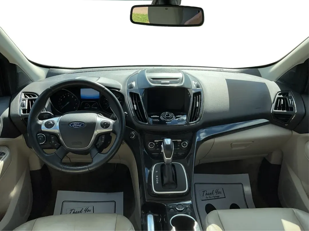 2014 Ford Escape Titanium 4WD (1FMCU9J92EU) with an 2.0L L4 DOHC 16V engine, 6-Speed Automatic transmission, located at 401 Woodman Dr, Riverside, OH, 45431, (937) 908-9800, 39.760899, -84.123421 - Looking for a versatile vehicle that accommodates your dynamic lifestyle? Meet the 2014 Ford Escape Titanium, the perfect SUV for growing families, adventurous souls, and budget-conscious buyers alike! With its impressive blend of performance, comfort, and cutting-edge technology, this Ford Escape i - Photo#21