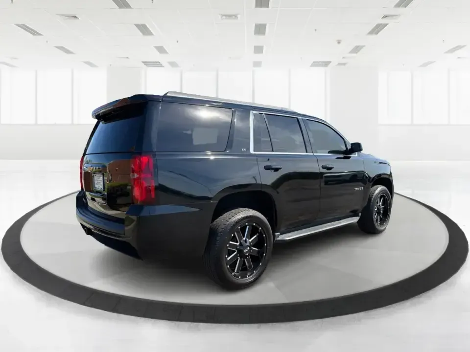 2015 Chevrolet Tahoe LT (1GNSKBKC1FR) with an EcoTec3 5.3L V-8 gasoline direct injection engine, 6-Speed Automatic transmission, located at 8750 N County Rd 25A, Piqua, OH, 45356, (937) 908-9800, 40.164391, -84.232513 - Big weekends, big families, and big Ohio road trips call for a full-size SUV that can handle it all-and this **2015 Chevrolet Tahoe LT 4WD** is built for exactly that lifestyle. Whether you're loading up for a day at **Indian Lake**, hauling sports gear across town, or cruising I75 for a long commut - Photo#2