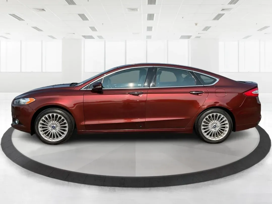 2016 Ford Fusion Titanium (3FA6P0K92GR) with an EcoBoost 2L I-4 gasoline direct injection engine, located at 1184 Kauffman Ave, Fairborn, OH, 45324, (937) 908-9800, 39.807072, -84.030914 - **Elevate Your Driving Experience with the 2016 Ford Fusion Titanium Where Style Meets Functionality!**<br /> <br /> Are you searching for the perfect blend of style, comfort, and advanced technology for your daily commute or weekend getaways? Look no further than the stunning 2016 Ford Fusion Tita - Photo#5