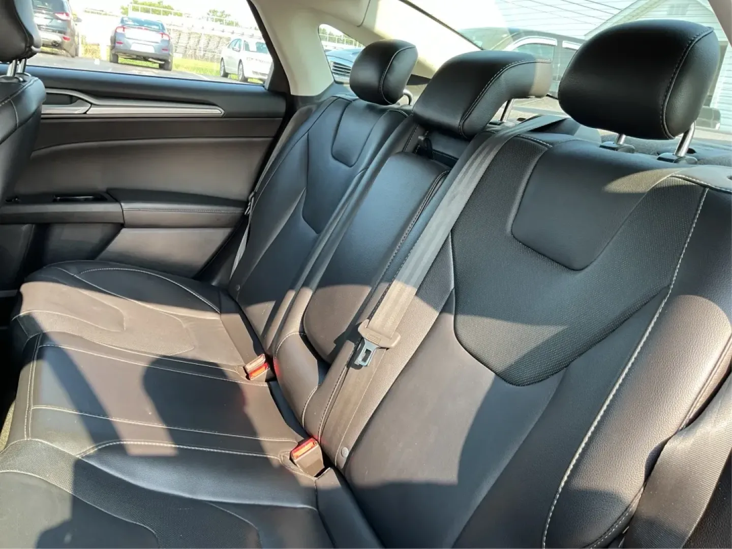 2016 Ford Fusion Titanium (3FA6P0K92GR) with an EcoBoost 2L I-4 gasoline direct injection engine, located at 1099 N County Rd 25A, Troy, OH, 45373, (937) 908-9800, 40.057079, -84.212883 - **Elevate Your Driving Experience with the 2016 Ford Fusion Titanium Where Style Meets Functionality!**<br /> <br /> Are you searching for the perfect blend of style, comfort, and advanced technology for your daily commute or weekend getaways? Look no further than the stunning 2016 Ford Fusion Tita - Photo#10