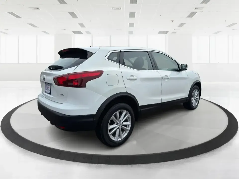 2018 Nissan Rogue S (JN1BJ1CRXJW) with an 2L I-4 gasoline direct injection engine, CVT transmission, located at 1099 N County Rd 25A, Troy, OH, 45373, (937) 908-9800, 40.057079, -84.212883 - Pack up the kids, load the groceries, or point the hood toward a weekend getaway-this 2018 Nissan Rogue S in Glacier White is the kind of everyday SUV that fits real life in Troy. With a comfortable cabin, practical cargo space, and confidence-inspiring AWD capability, it's ideal for long commutes, - Photo#2