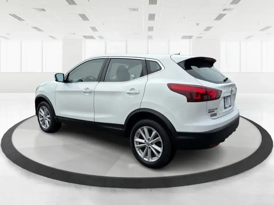 2018 Nissan Rogue S (JN1BJ1CRXJW) with an 2L I-4 gasoline direct injection engine, CVT transmission, located at 1099 N County Rd 25A, Troy, OH, 45373, (937) 908-9800, 40.057079, -84.212883 - Pack up the kids, load the groceries, or point the hood toward a weekend getaway-this 2018 Nissan Rogue S in Glacier White is the kind of everyday SUV that fits real life in Troy. With a comfortable cabin, practical cargo space, and confidence-inspiring AWD capability, it's ideal for long commutes, - Photo#4