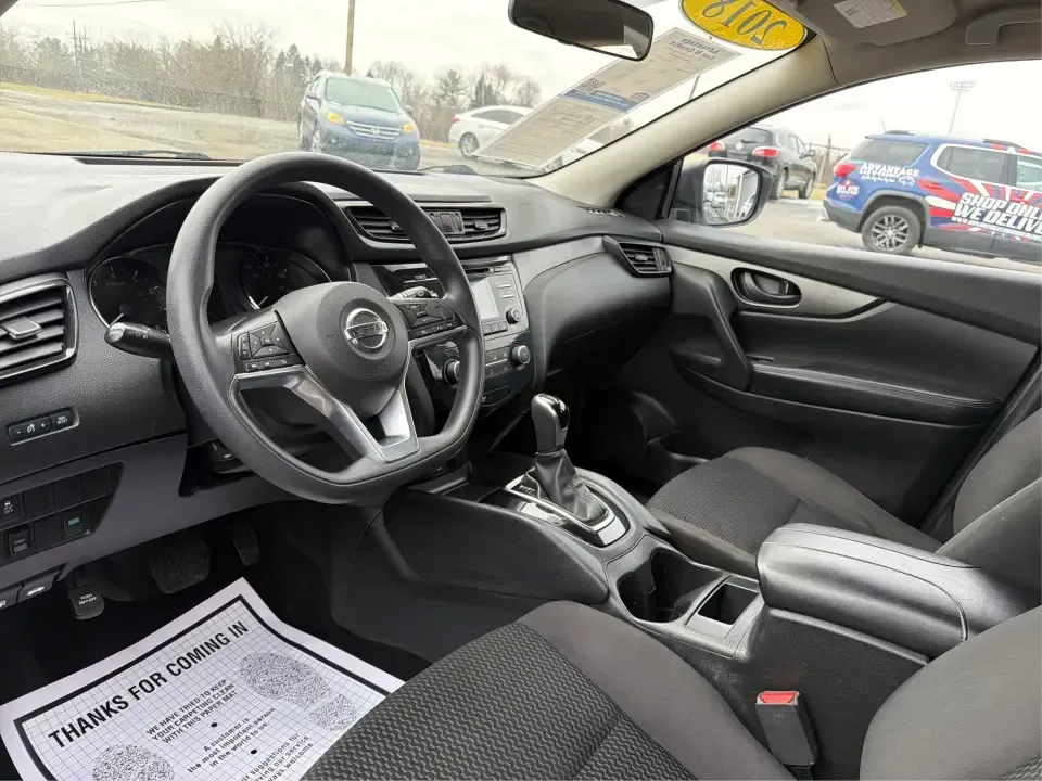 2018 Nissan Rogue S (JN1BJ1CRXJW) with an 2L I-4 gasoline direct injection engine, CVT transmission, located at 1099 N County Rd 25A, Troy, OH, 45373, (937) 908-9800, 40.057079, -84.212883 - Pack up the kids, load the groceries, or point the hood toward a weekend getaway-this 2018 Nissan Rogue S in Glacier White is the kind of everyday SUV that fits real life in Troy. With a comfortable cabin, practical cargo space, and confidence-inspiring AWD capability, it's ideal for long commutes, - Photo#9