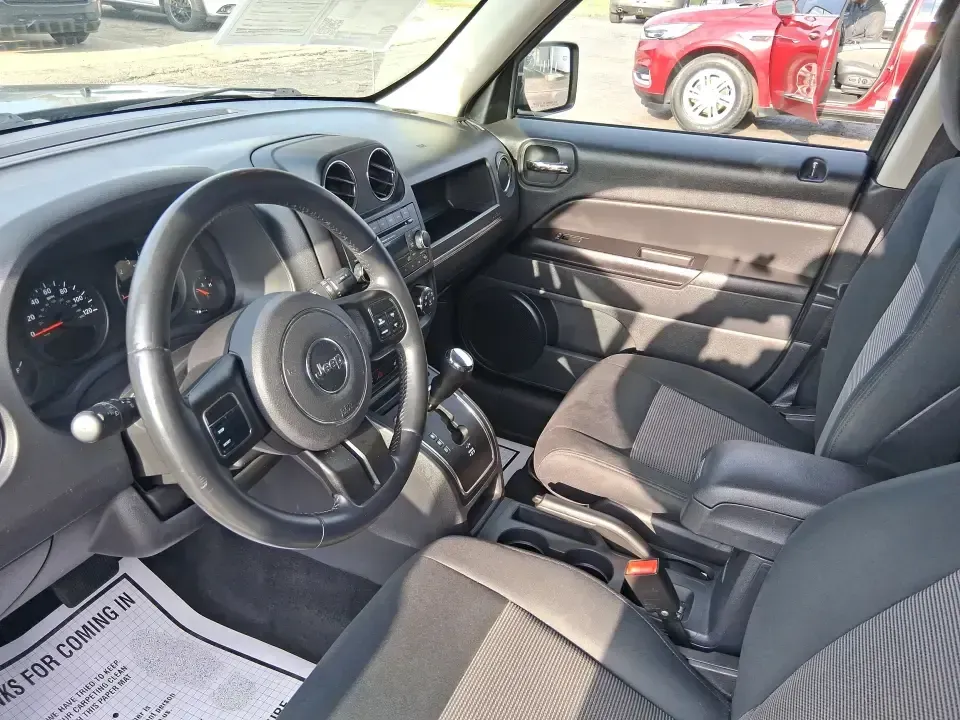 2012 Jeep Patriot Latitude (1C4NJRFB1CD) with an 2.4L I-4 DOHC engine, Automatic transmission, located at 8750 N County Rd 25A, Piqua, OH, 45356, (937) 908-9800, 40.164391, -84.232513 - Experience the thrill of adventure with the 2012 Jeep Patriot Latitude, now available at Advantage Car and Credit in Troy, OH! Perfect for weekend getaways or daily commutes, this versatile SUV is designed to meet the needs of both adventure-seekers and budget-conscious buyers alike. With its rugged - Photo#9