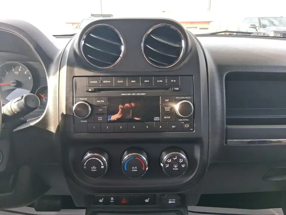 2012 Jeep Patriot Latitude (1C4NJRFB1CD) with an 2.4L I-4 DOHC engine, Automatic transmission, located at 8750 N County Rd 25A, Piqua, OH, 45356, (937) 908-9800, 40.164391, -84.232513 - Experience the thrill of adventure with the 2012 Jeep Patriot Latitude, now available at Advantage Car and Credit in Troy, OH! Perfect for weekend getaways or daily commutes, this versatile SUV is designed to meet the needs of both adventure-seekers and budget-conscious buyers alike. With its rugged - Photo#13