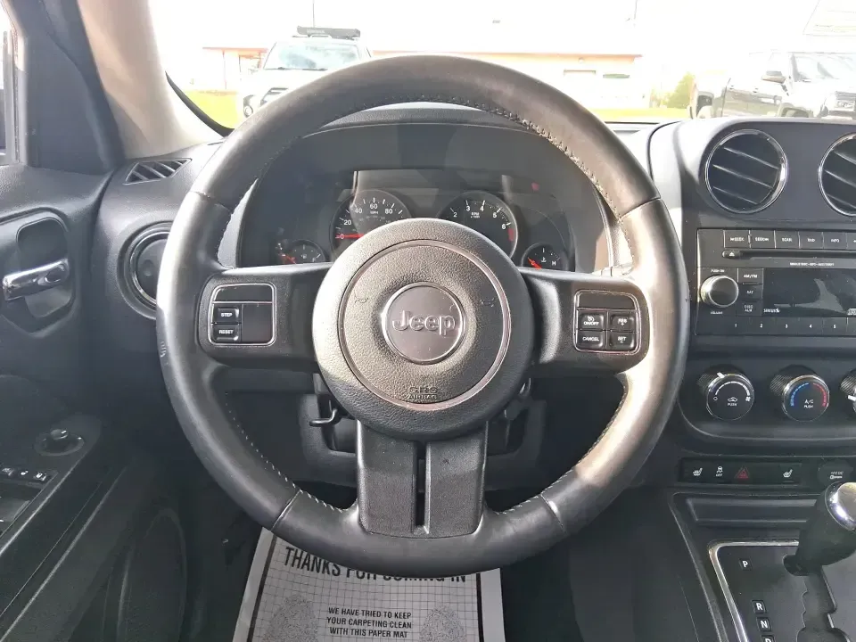 2012 Jeep Patriot Latitude (1C4NJRFB1CD) with an 2.4L I-4 DOHC engine, Automatic transmission, located at 8750 N County Rd 25A, Piqua, OH, 45356, (937) 908-9800, 40.164391, -84.232513 - Experience the thrill of adventure with the 2012 Jeep Patriot Latitude, now available at Advantage Car and Credit in Troy, OH! Perfect for weekend getaways or daily commutes, this versatile SUV is designed to meet the needs of both adventure-seekers and budget-conscious buyers alike. With its rugged - Photo#16