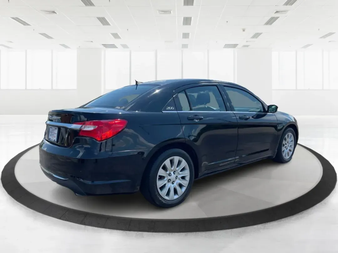2014 Chrysler 200 LX (1C3CCBAG7EN) with an Other engine, located at 1230 East Main St, Xenia, OH, 45385, (937) 908-9800, 39.688026, -83.910172 - Are you looking for a reliable car that seamlessly fits into your busy lifestyle? Look no further than this stunning 2014 Chrysler 200 LX, available now at Advantage Car and Credit in Fairborn, OH. This stylish sedan is perfect for growing families, daily commuters, or anyone seeking a dependable ve - Photo#2